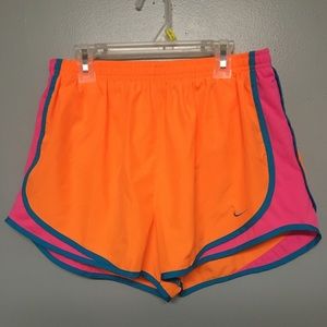 Orange Nike dry- fit shorts